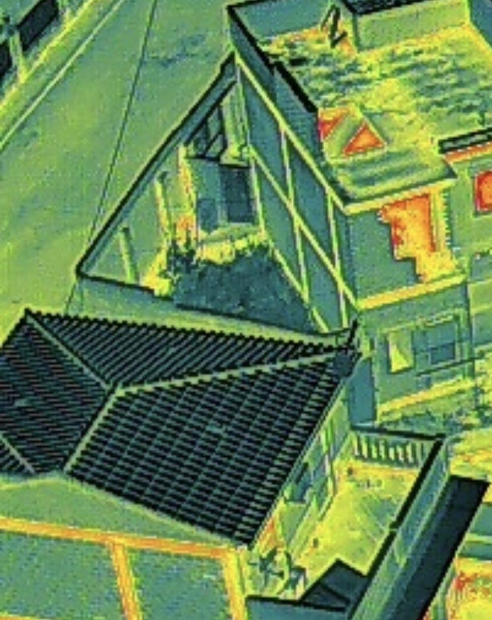 Termografía aérea de una vivienda unifamiliar: cubierta de teja, terraza y paramentos con distinta respuesta térmica